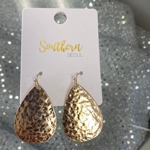Gold bronze earrings. Never worn brand new.